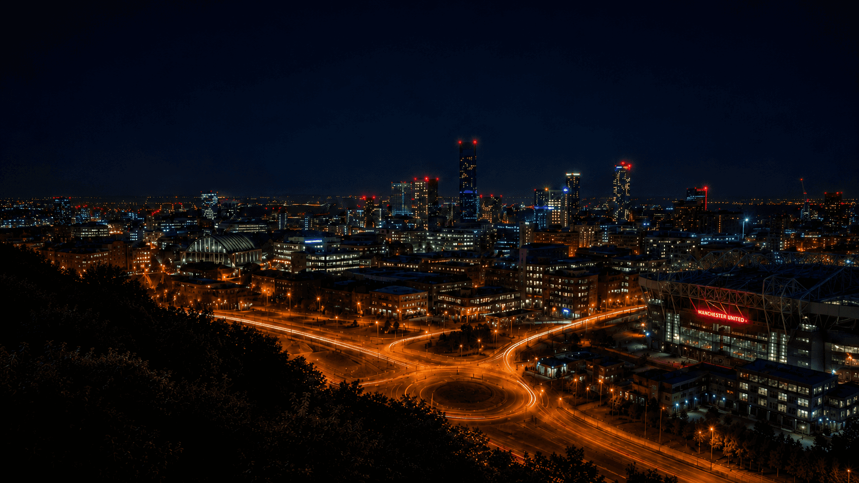 Manchester skyline at night — Empire outcall coverage area